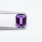 Load image into Gallery viewer, Emerald lab grown purple sapphire