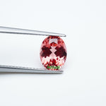 Load image into Gallery viewer, Oval lab grown padparadscha sapphire