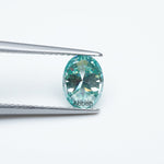 Load image into Gallery viewer, Oval teal moissanite