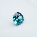Load image into Gallery viewer, Round lab grown Paraiba YAG