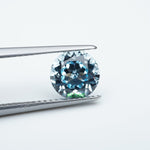 Load image into Gallery viewer, Round lab grown aqua sapphire