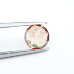 Load image into Gallery viewer, Round lab grown orange sapphire