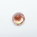 Load image into Gallery viewer, Round lab grown orange sapphire