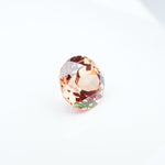 Load image into Gallery viewer, Round lab grown orange sapphire