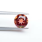 Load image into Gallery viewer, Round lab grown sunset coral padparadscha sapphire