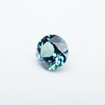 Load image into Gallery viewer, Round lab grown teal sapphire