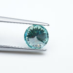 Load image into Gallery viewer, Round teal moissanite