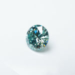 Load image into Gallery viewer, Round teal moissanite