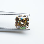 Load and play video in Gallery viewer, Cushion brown moissanite