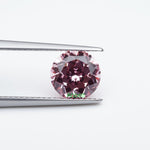 Load and play video in Gallery viewer, Round lab grown champagne sapphire