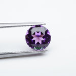 Load and play video in Gallery viewer, Round lab grown purple sapphire