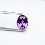 Load and play video in Gallery viewer, Oval lab grown purple sapphire