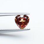 Load and play video in Gallery viewer, Heart lab grown orange sapphire