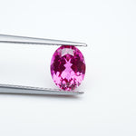Load and play video in Gallery viewer, Oval lab grown hot pink sapphire