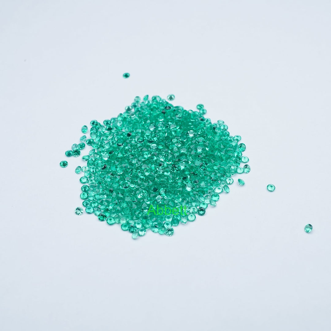 Round lab grown emerald melee