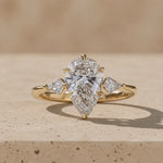 1.5 CT Pear Cut Lab-Grown Diamond Three-Stone Engagement Ring