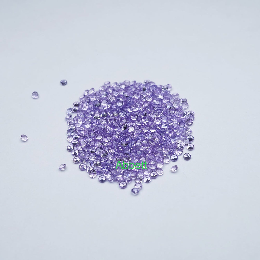 Round melee lab grown purple sapphire