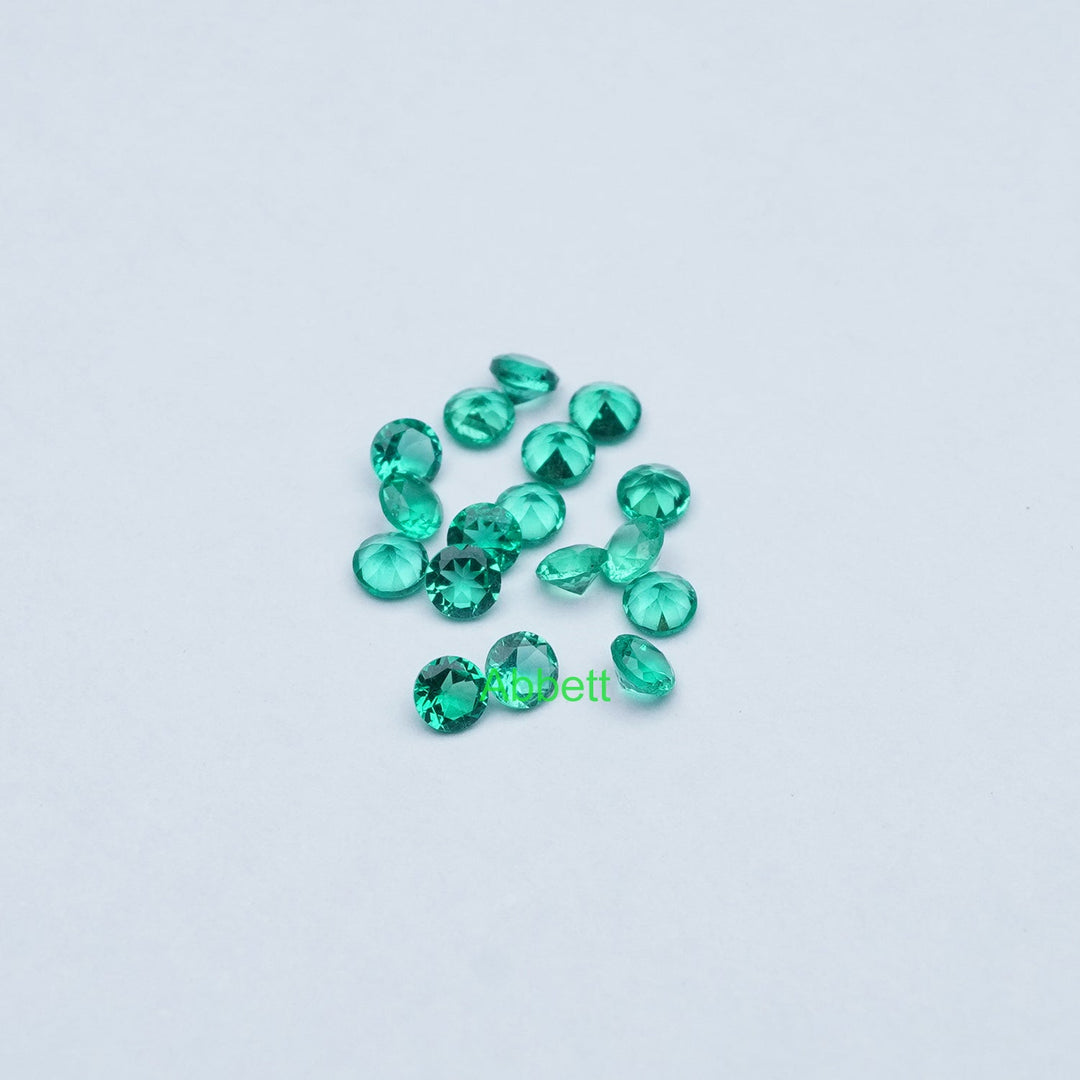 Round lab grown emerald melee