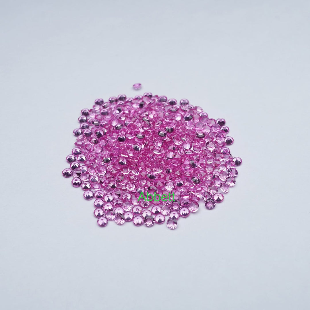 Round melee lab grown hot pink sapphire