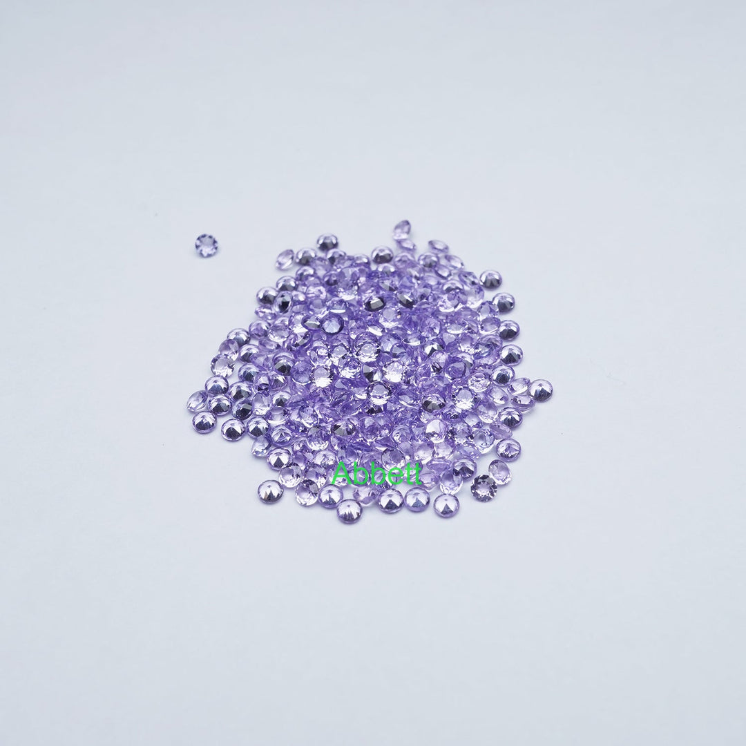 Round melee lab grown purple sapphire