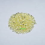 Load image into Gallery viewer, Round melee lab grown yellow sapphire
