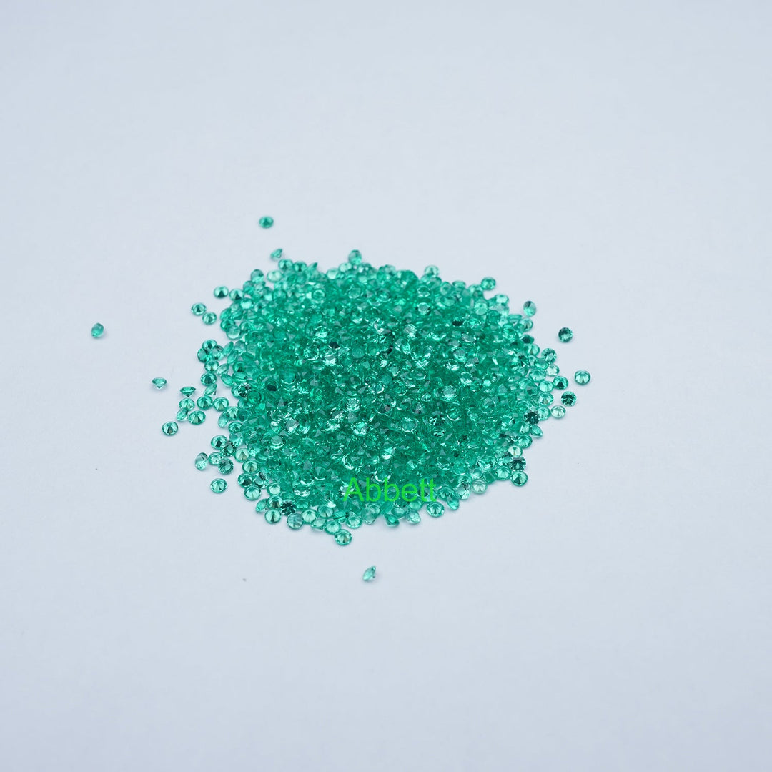 Round lab grown emerald melee