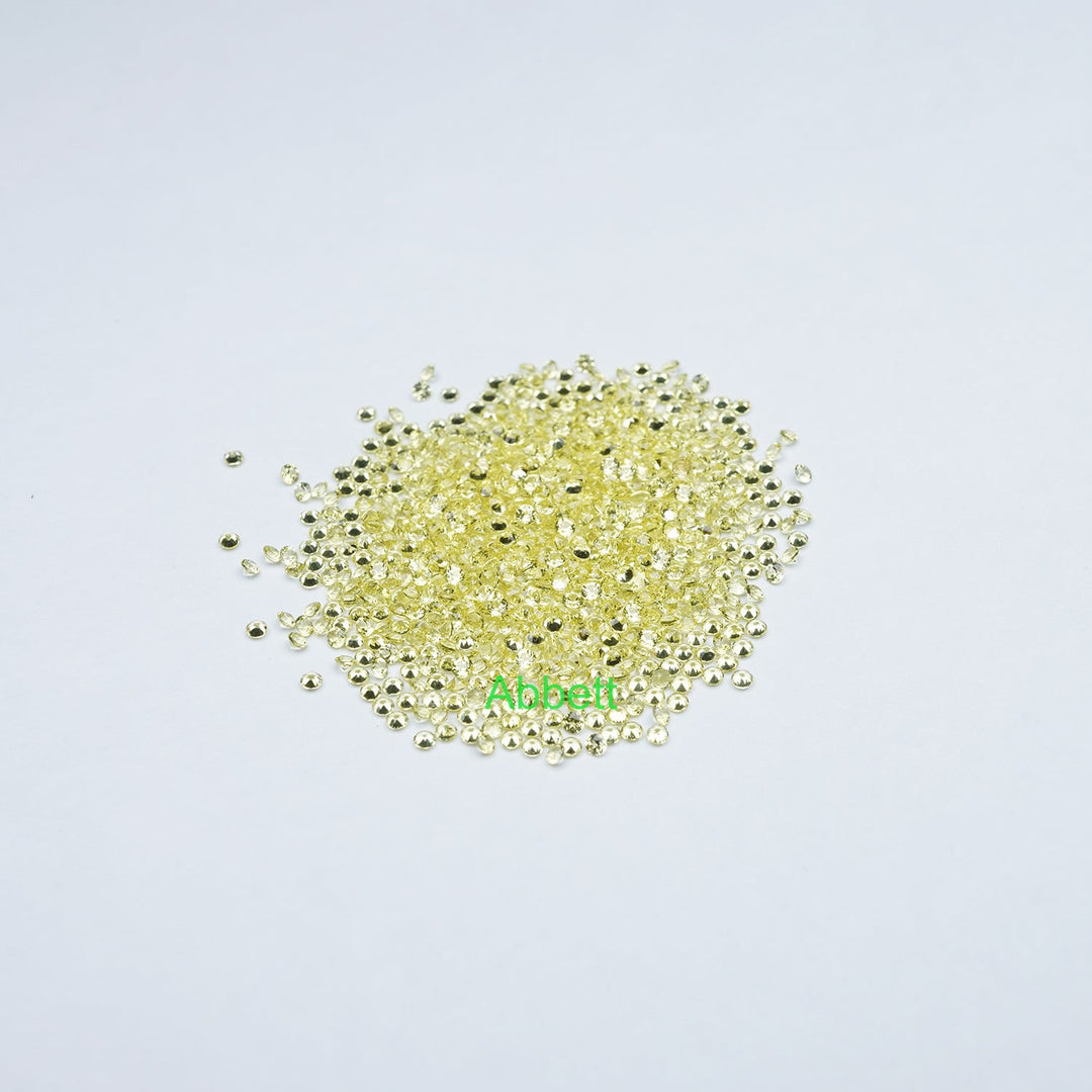 Round melee lab grown yellow sapphire