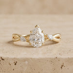 2.5 CT Pear Lab-Grown Diamond Three-Stone Split-Shank Leaf & Vine Engagement Ring