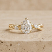 2.5 CT Pear Lab-Grown Diamond Three-Stone Split-Shank Leaf & Vine Engagement Ring