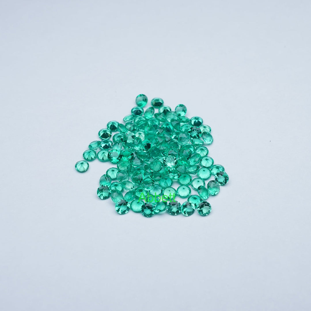 Round lab grown emerald melee