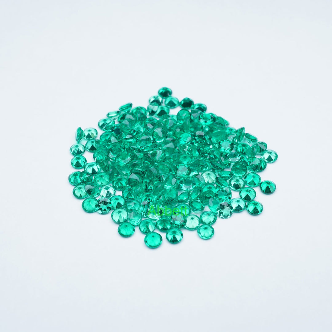 Round lab grown emerald melee