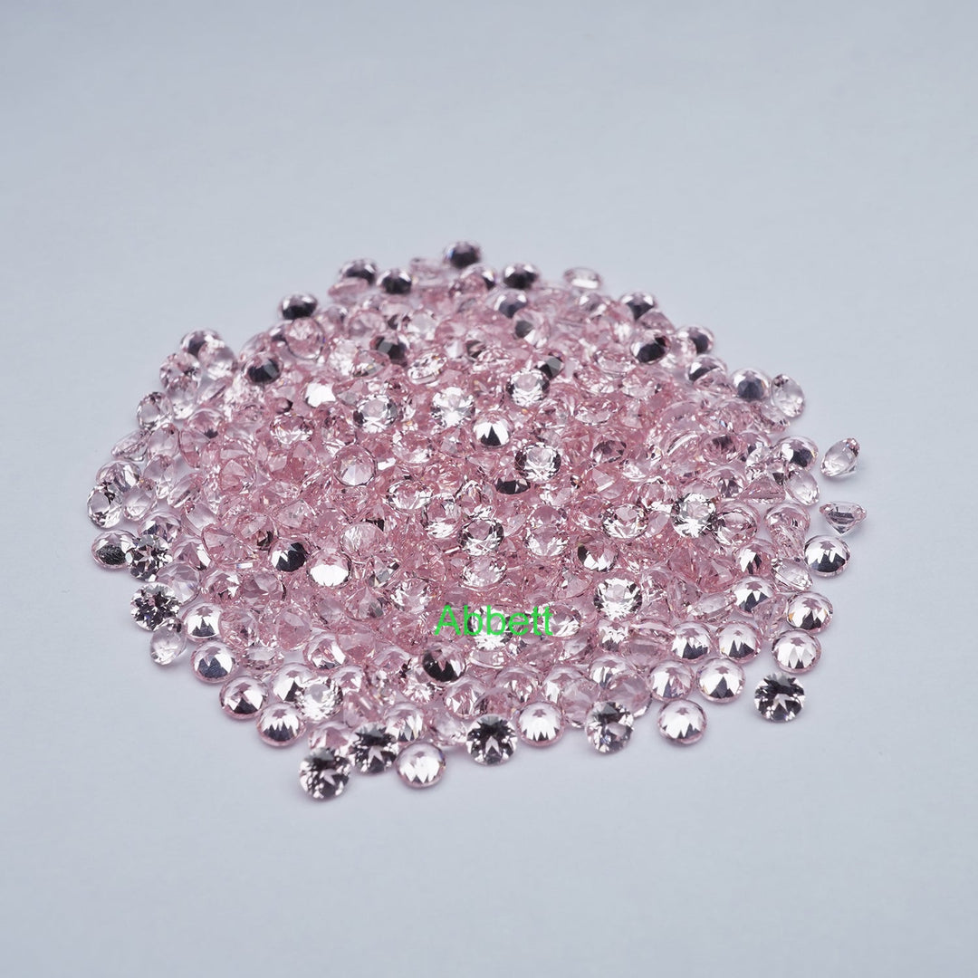 Round lab grown light pink sapphire melee