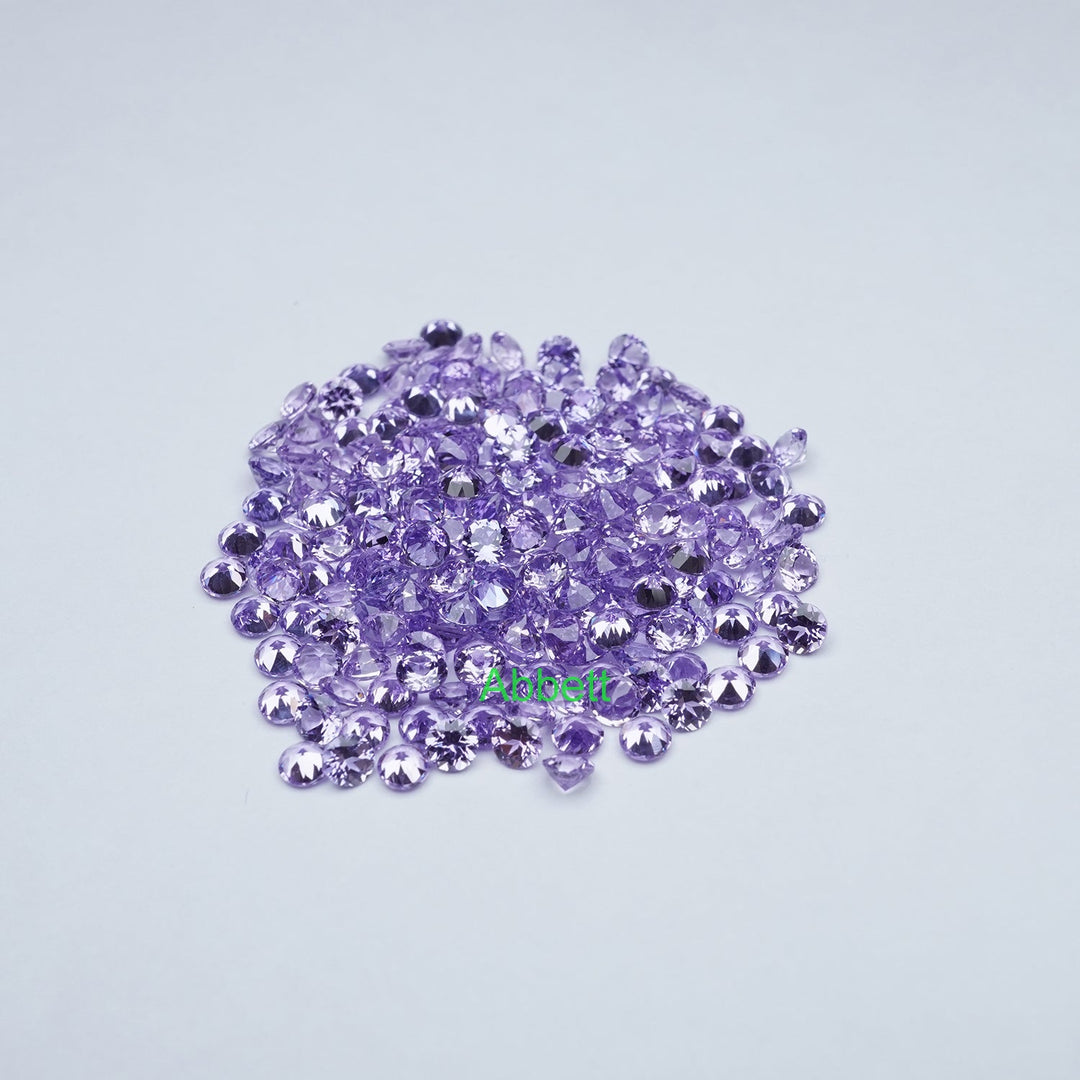 Round melee lab grown purple sapphire
