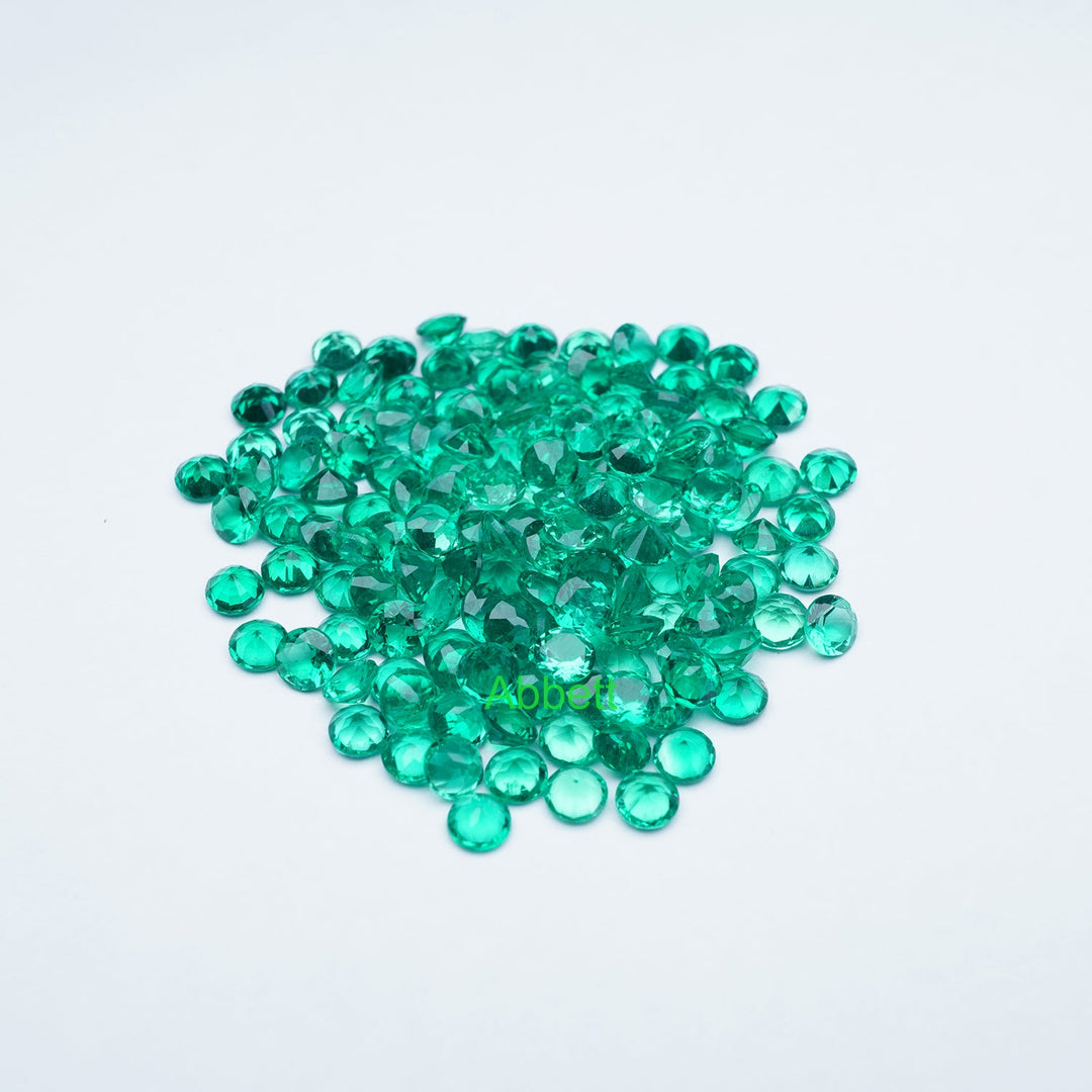 Round lab grown emerald melee