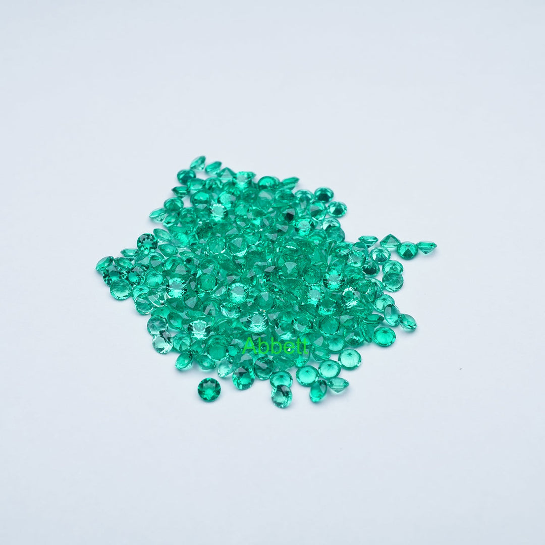 Round lab grown emerald melee
