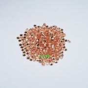 Round melee lab grown orange sapphire