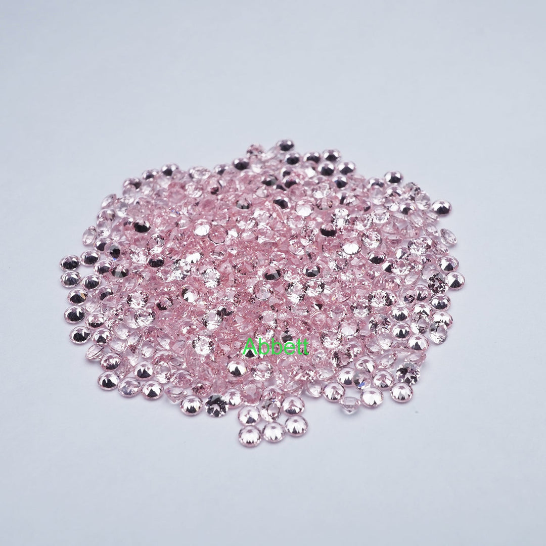 Round lab grown light pink sapphire melee