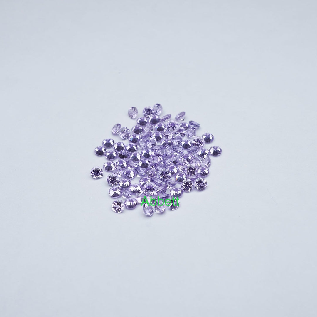 Round melee lab grown purple sapphire