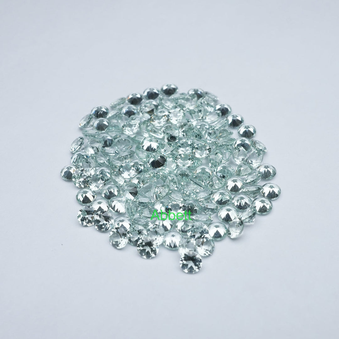 Round lab grown green sapphire melee