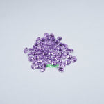 Load image into Gallery viewer, Round melee lab grown purple sapphire
