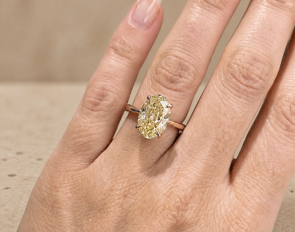 4 CT Fancy Yellow Elongated Oval Cut Lab-Grown Diamond Tulip-Set Solitaire Engagement Ring