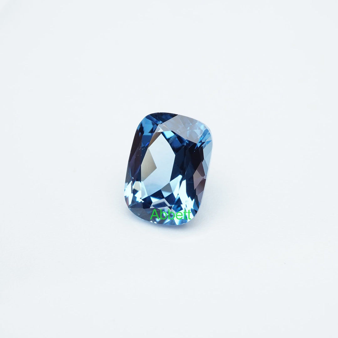 Antique cushion lab grown aqua spinel