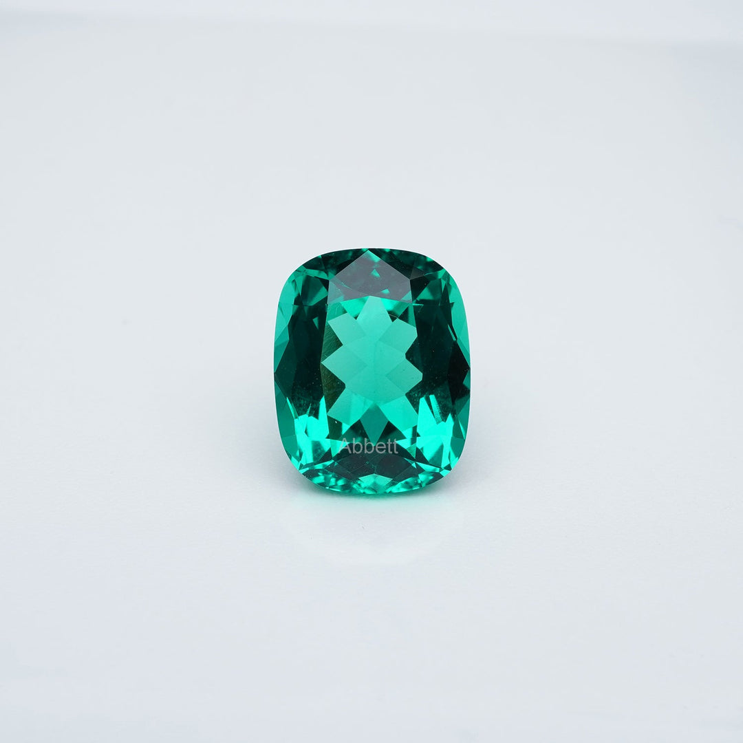 Antique cushion lab grown emerald