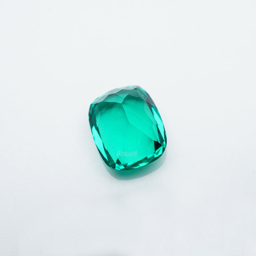 Antique cushion lab grown emerald