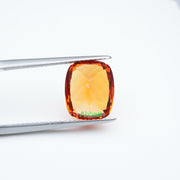 Antique cushion lab grown orange sapphire