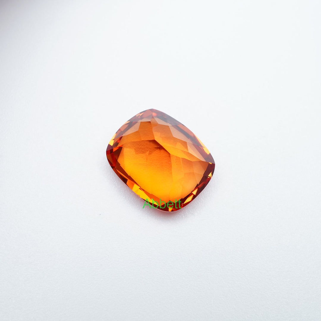 Antique cushion lab grown orange sapphire