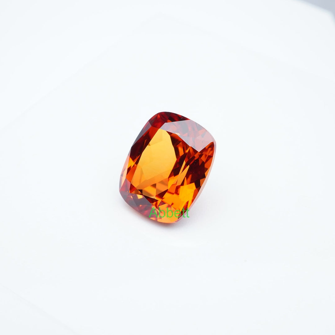 Antique cushion lab grown orange sapphire