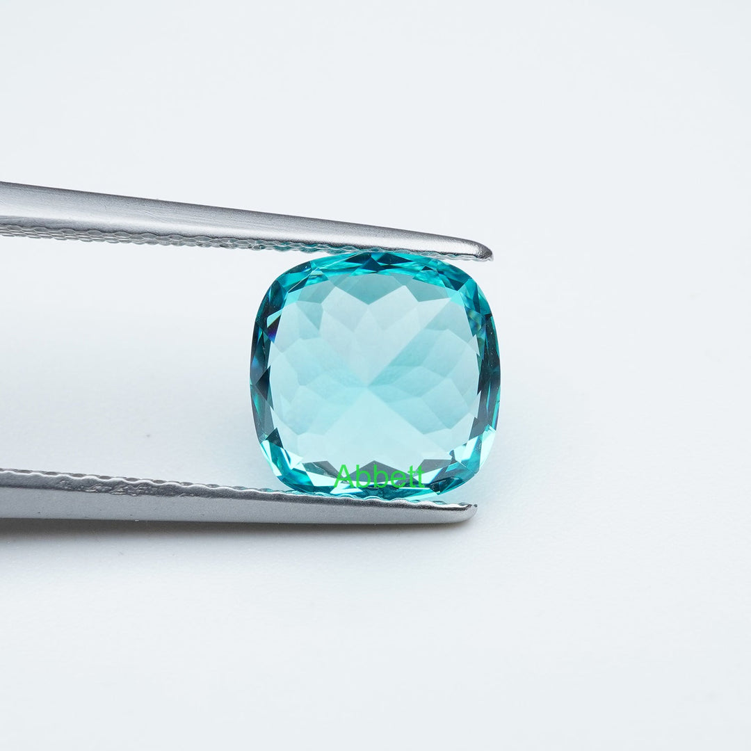 Cushion lab grown Paraiba YAG