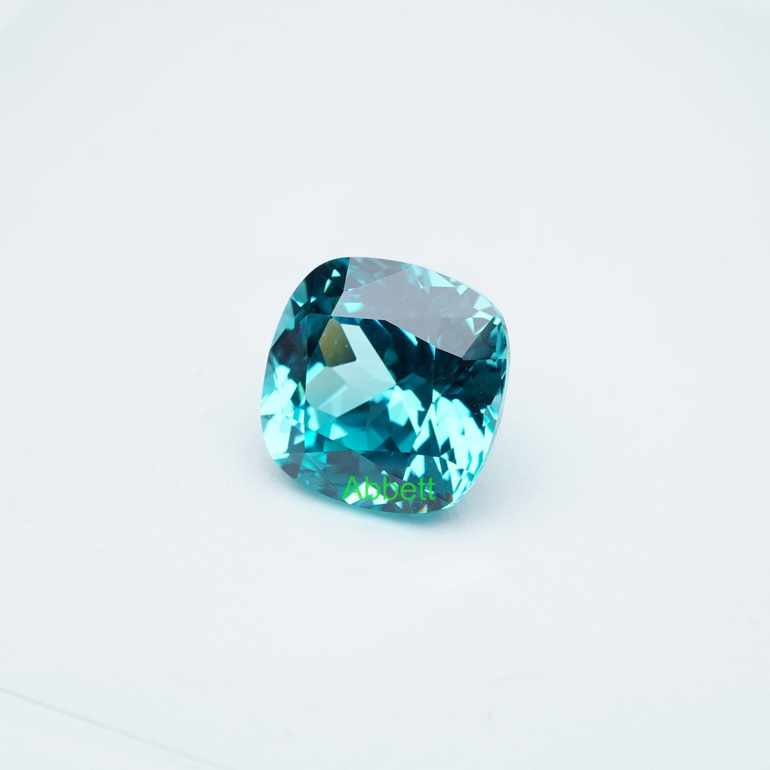Cushion lab grown Paraiba YAG