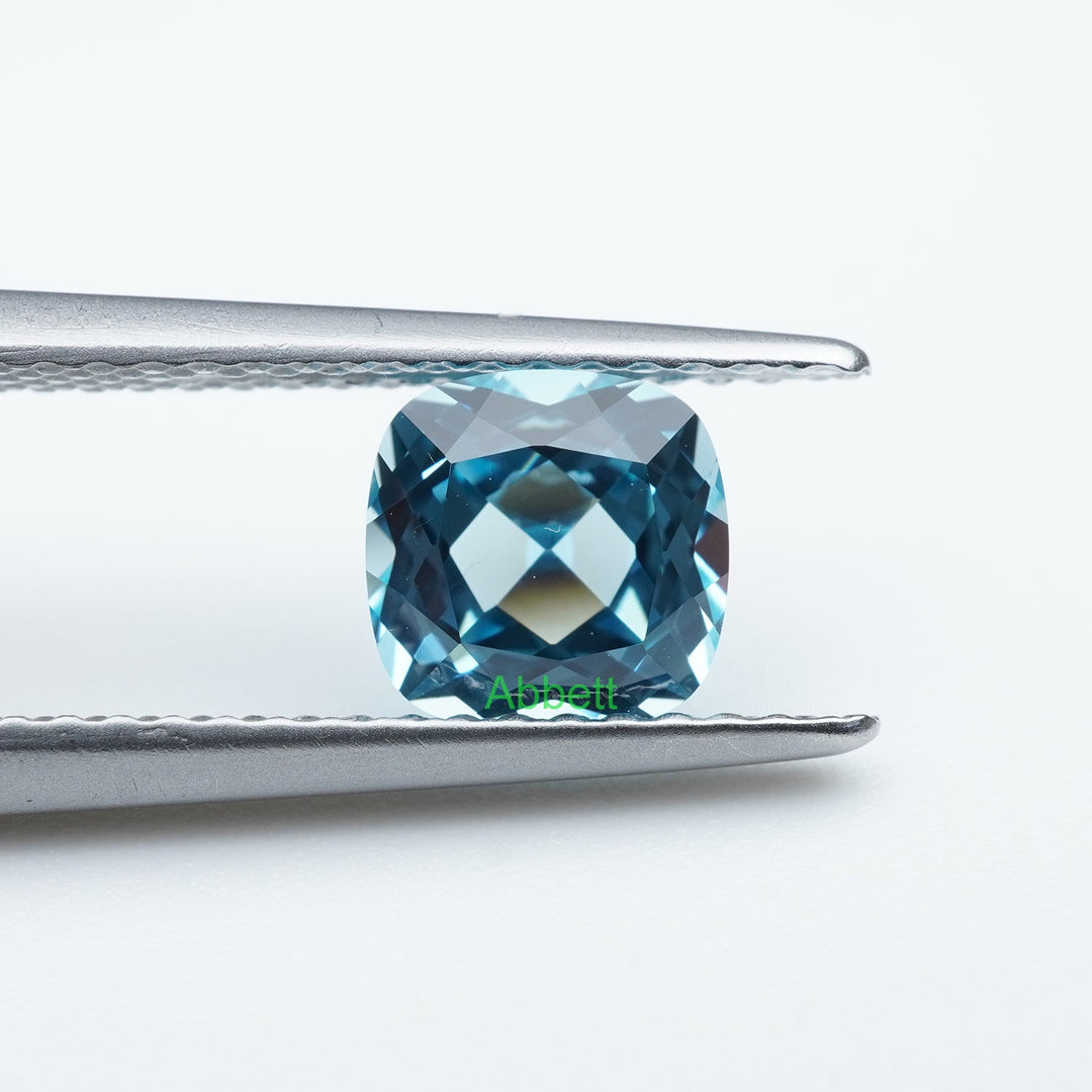 Cushion lab grown Santa Maria sapphire